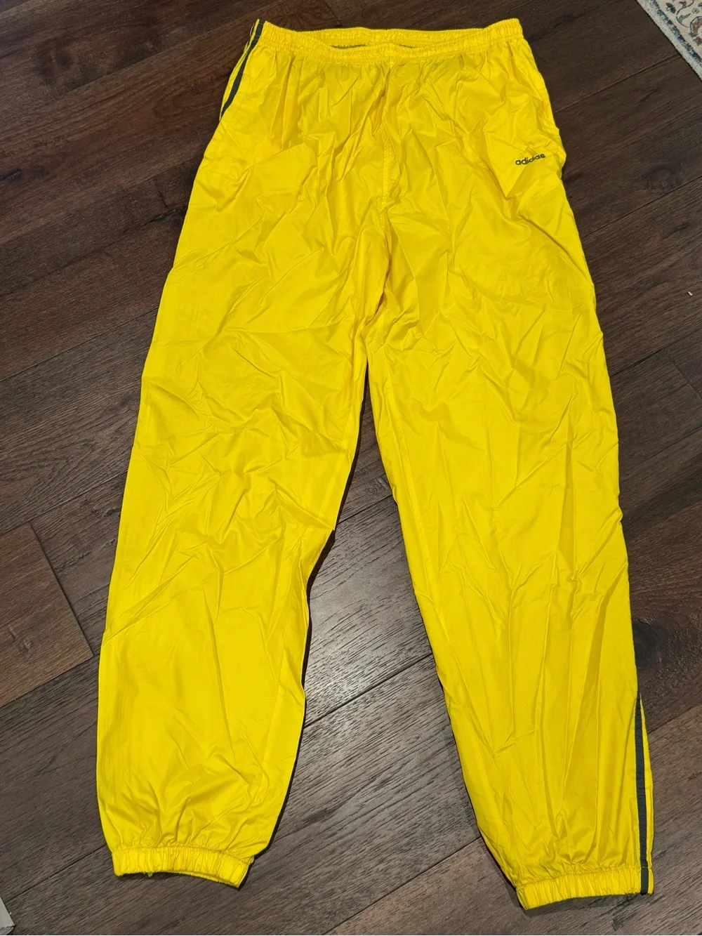 Vintage Adidas Women's Yellow Track Pants with Black Side Stripes